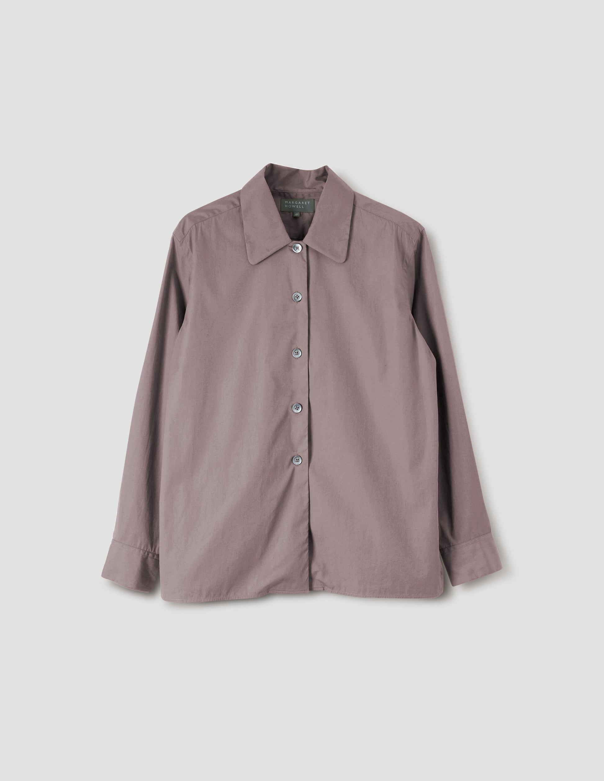 Pinkish brown shirt with a curved collar and side split hem. Front flat lay view.