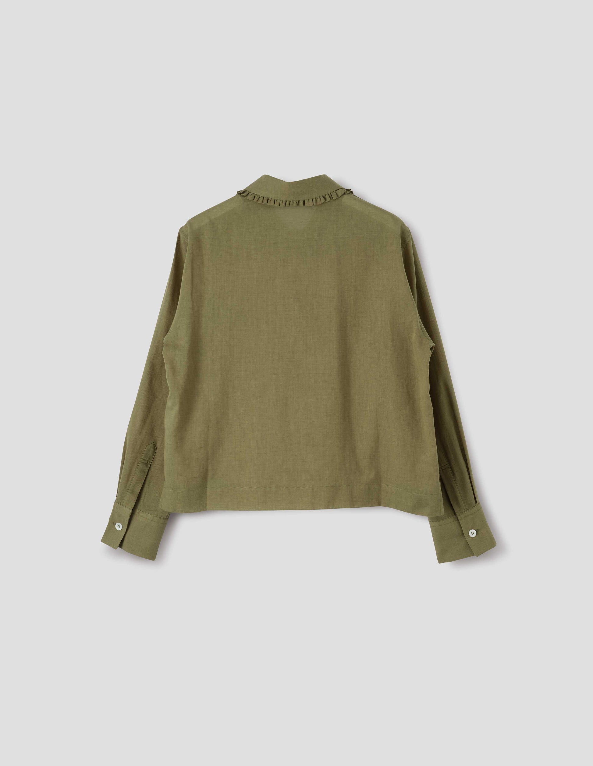 Green cotton cashmere frilled collar long sleeve shirt, with mother of pearl button cuffs. Back flat lay view. 