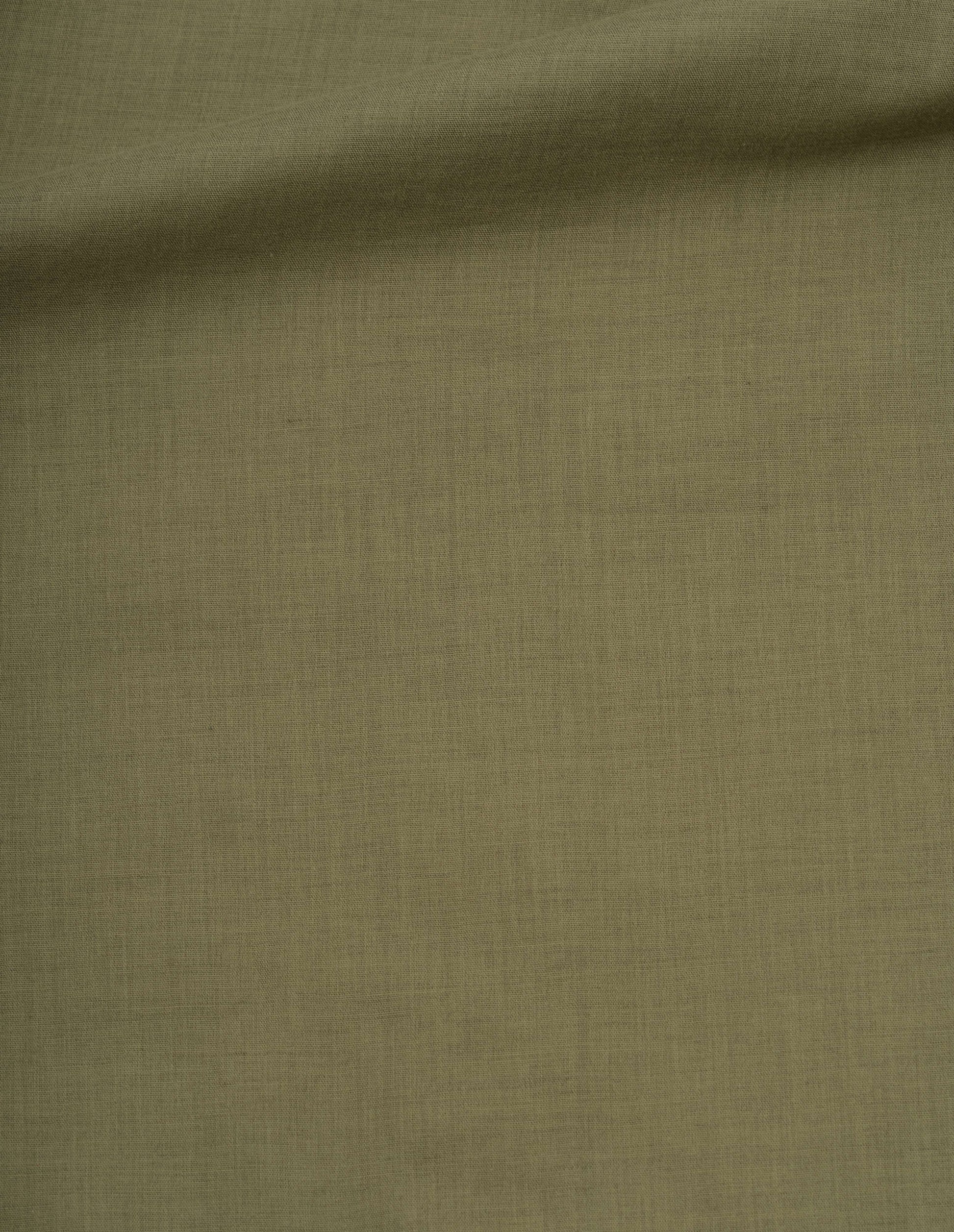 Green cotton wool voile frilled collar shirt, fabric swatch.