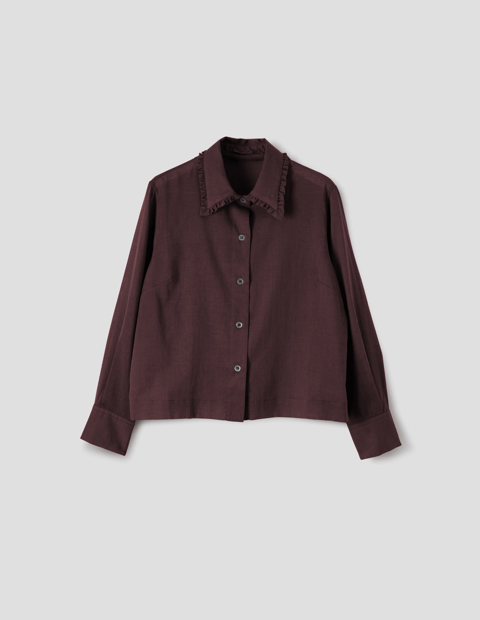 Dark red cotton silk frilled collar long sleeve shirt, with mother of pearl button closure. Front flat lay view. 