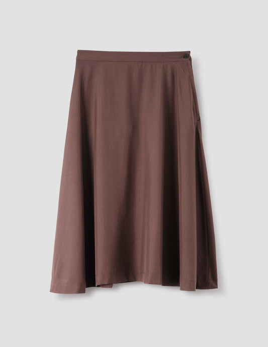 Brown matt silk skirt, with side closure and horn button detailing on the waist. Front flat lay view. 