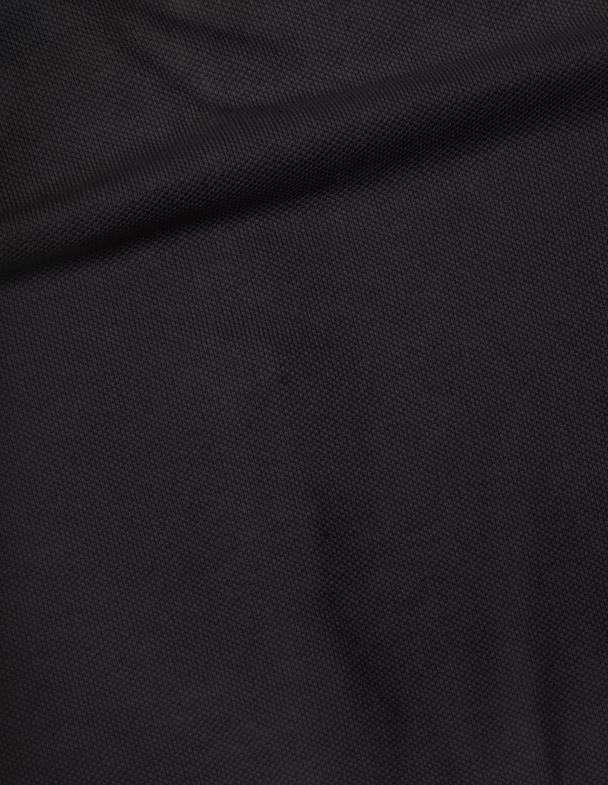 Black short sleeve knitted light cotton shirt fabric swatch.