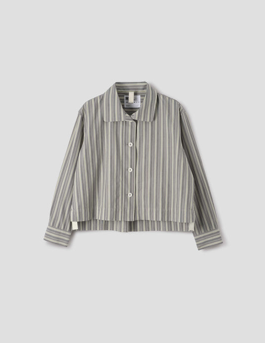 Grey, yellow and white striped cotton long sleeve shirt. With round collar, wide stitch through placket, stepped vent split hem and corozo brace button closure. Front flat lay view.