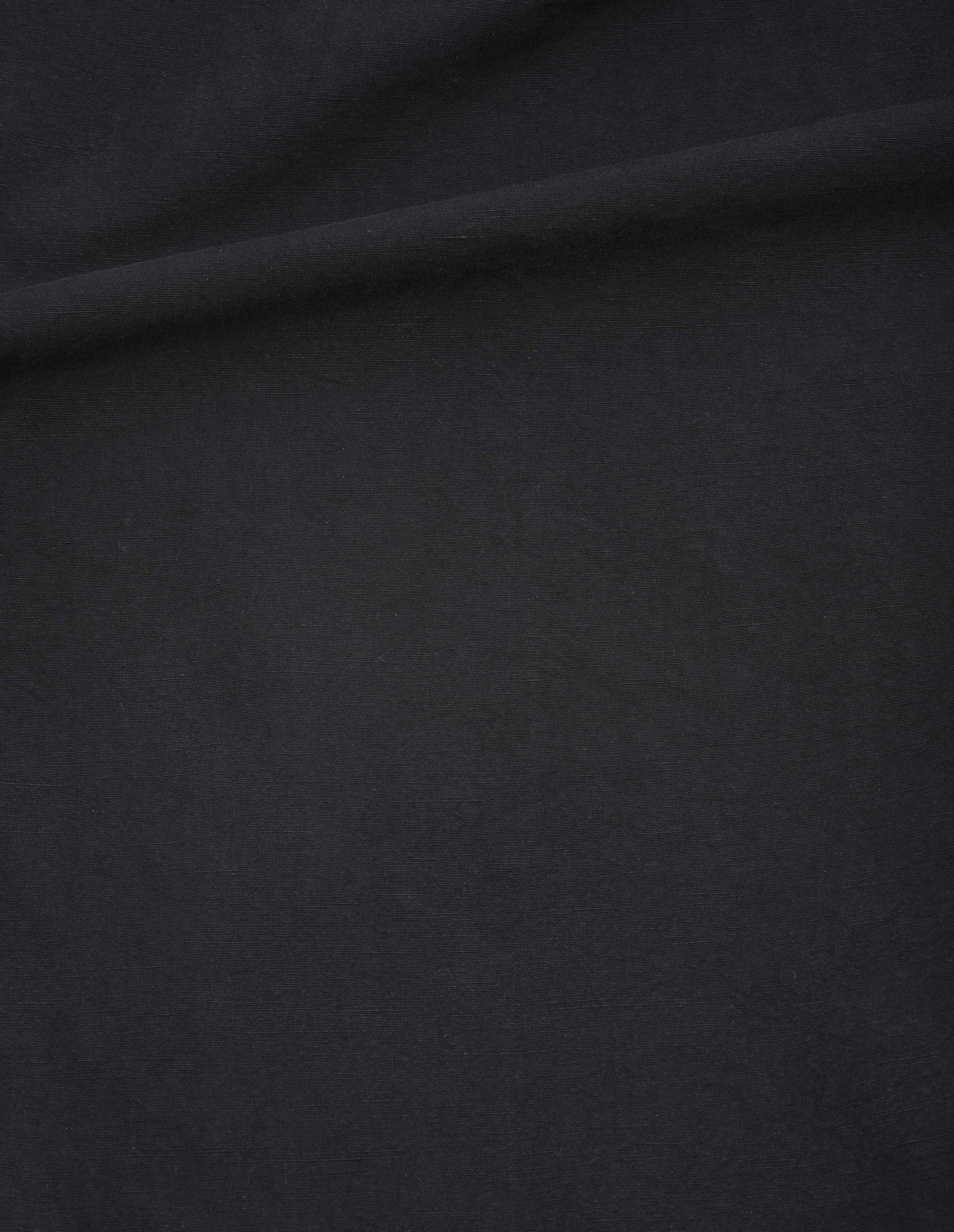 Black dry cotton linen trousers, fabric swatch. 