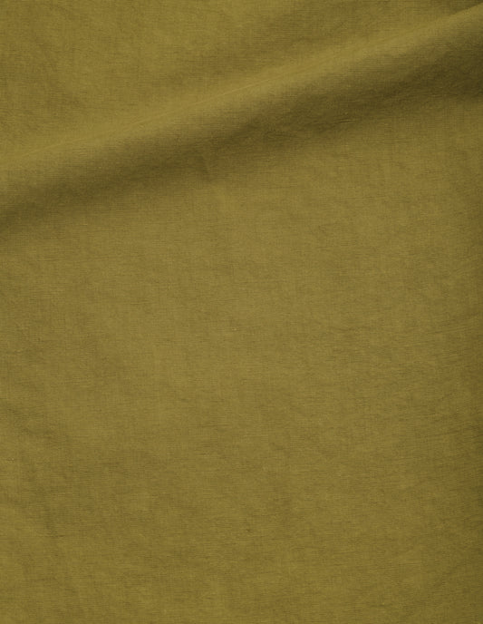 Light green dry cotton linen trousers, fabric swatch. 