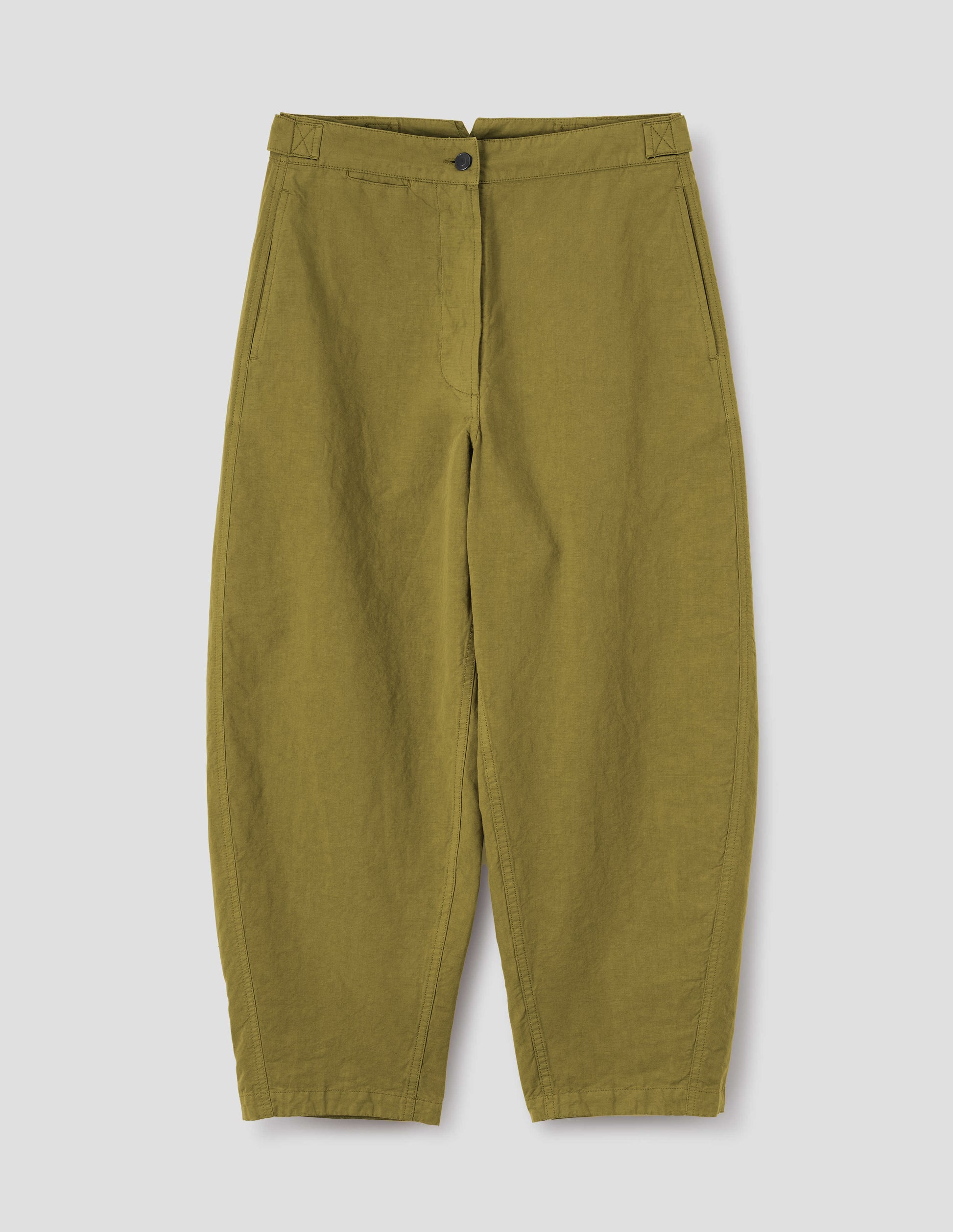 Light green trousers with slant side pockets, silver metal closure and adjustable waist tab detailing. Front flat lay view. 