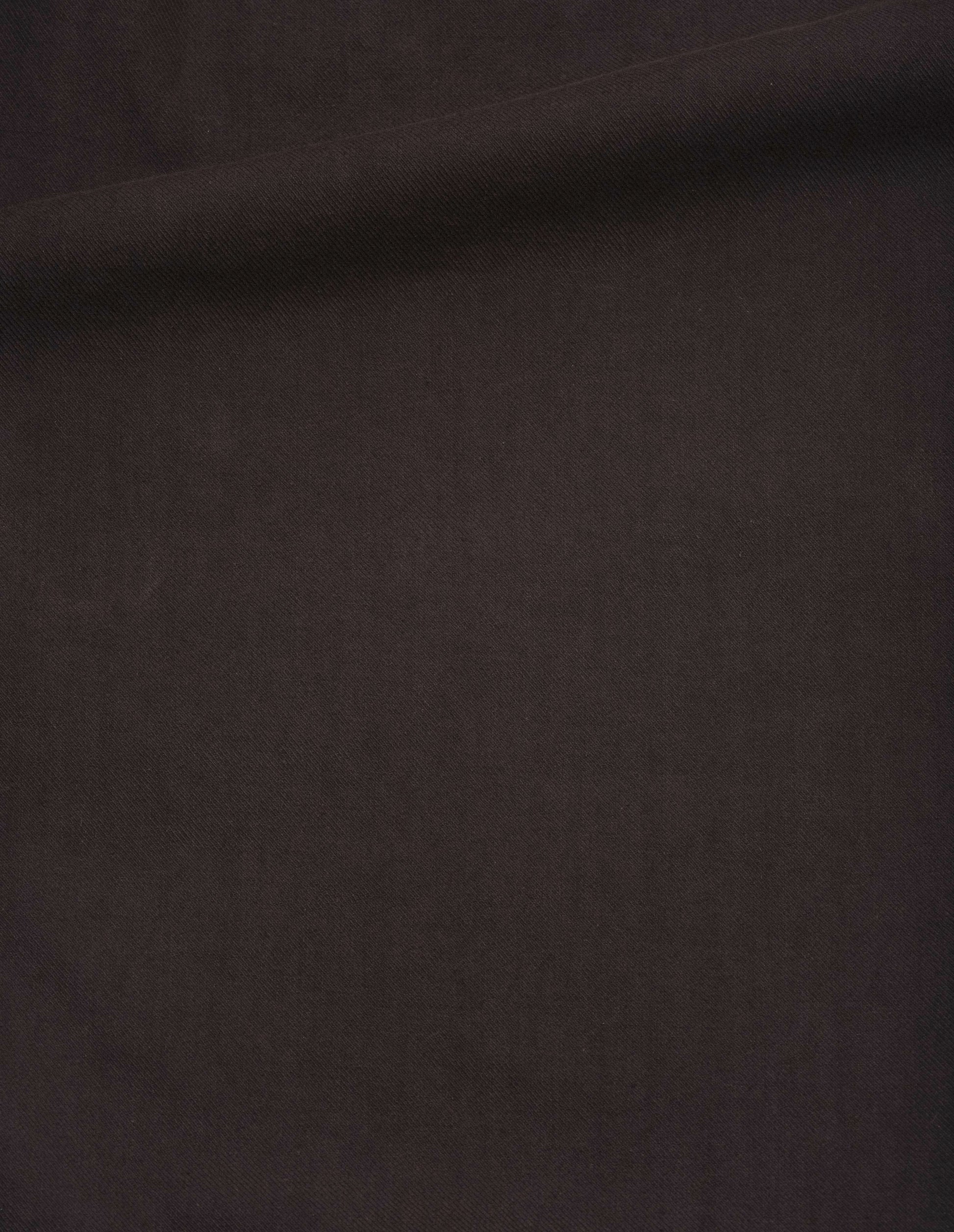 Dark brown irregular cotton drill button belt trousers, fabric swatch. 