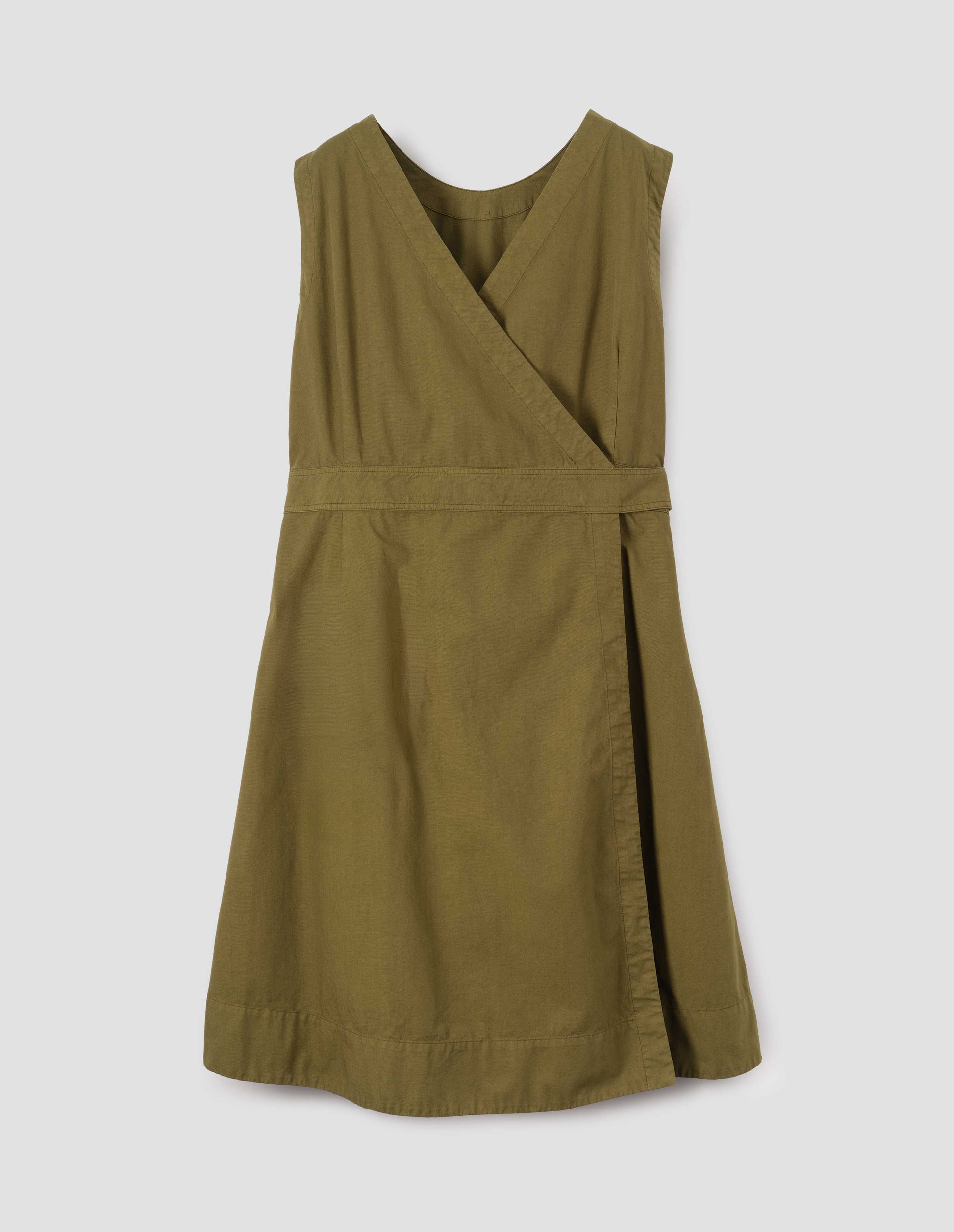 Green cotton sleeveless dress with v detail on back, wrap around belt and deep stitch hem. Back flat lay view.