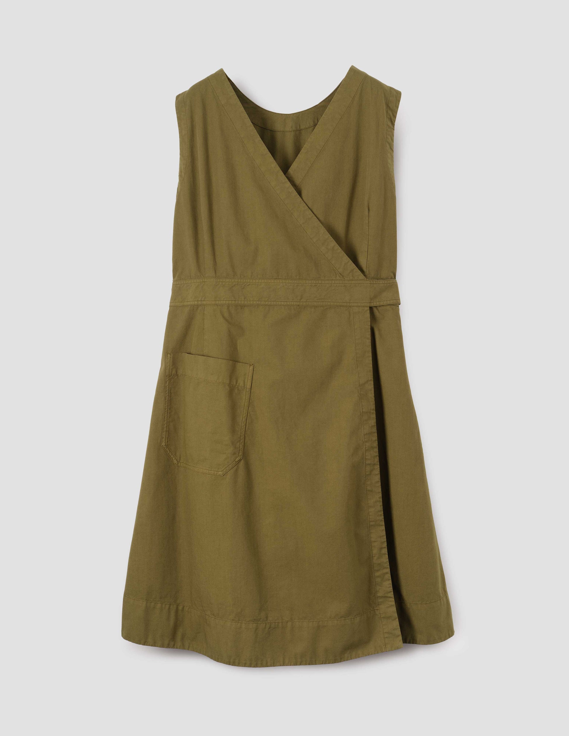 Green cotton sleeveless dress with v detail on back, wrap around belt, back patch pocket and deep stitch hem. Back flat lay view.