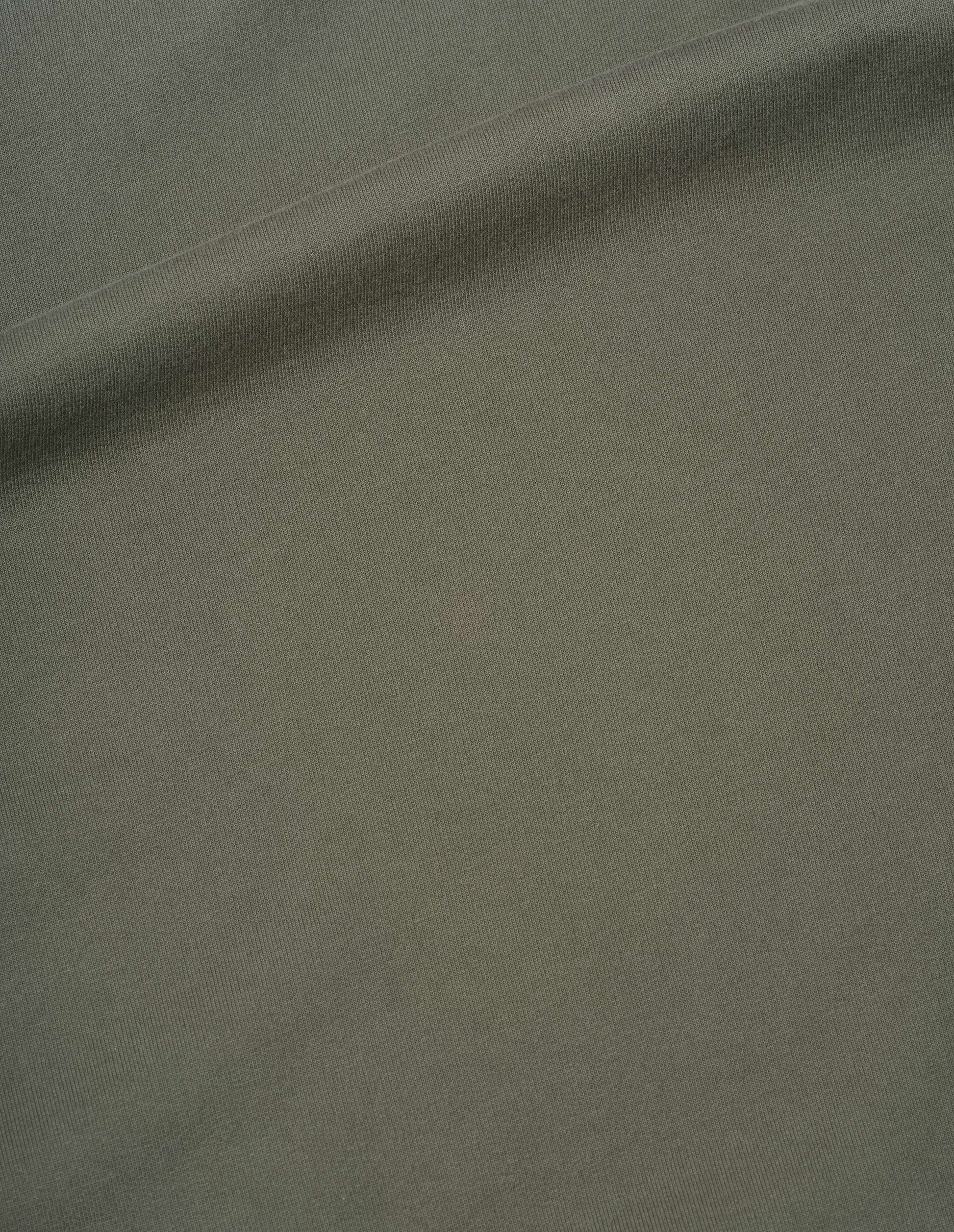 Green dry cotton loopback sweatshirt, fabric swatch.