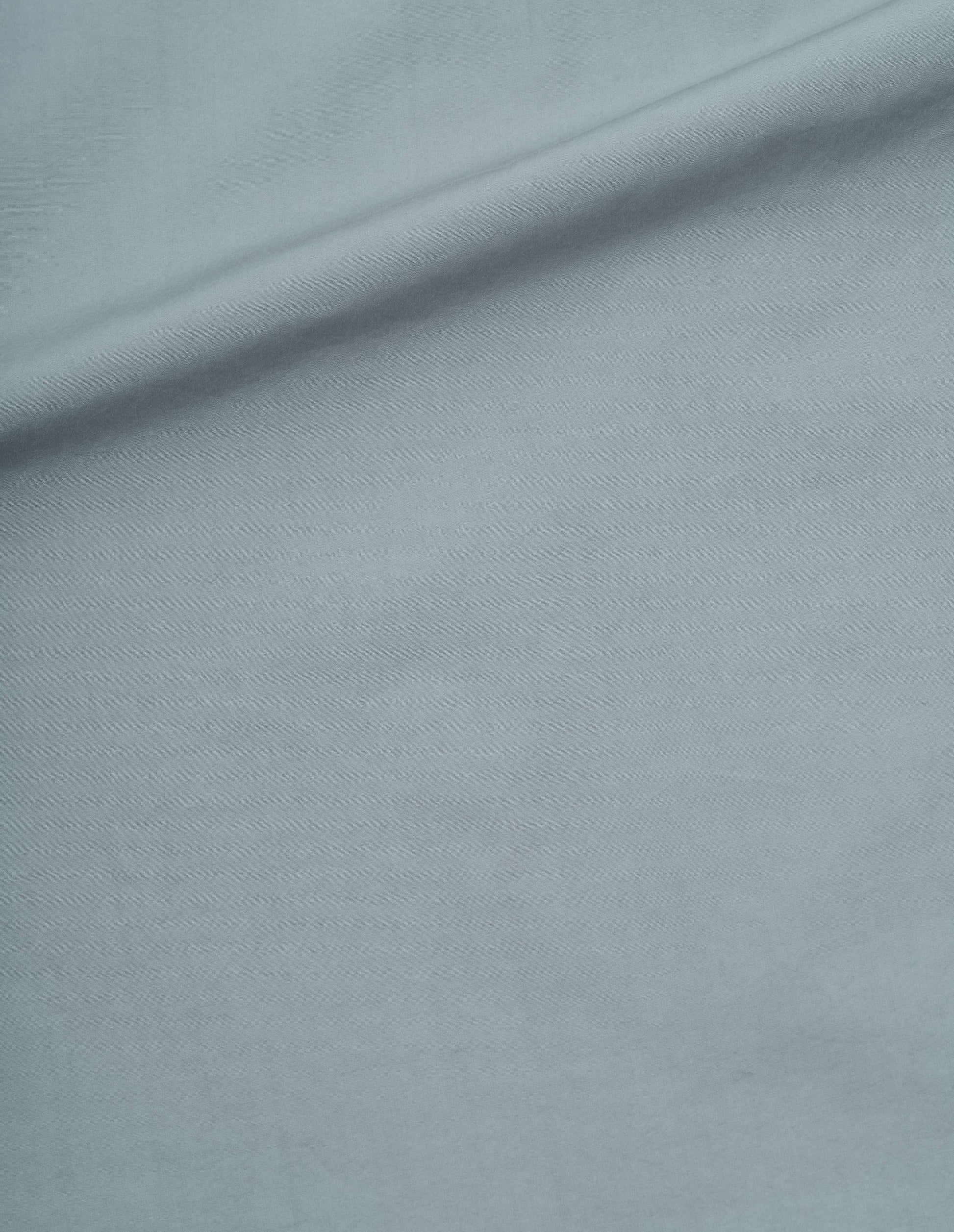 Blueish grey compact cotton shirt, fabric swatch.