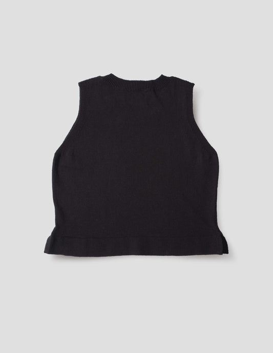 Black knitted tank top with single rib crew neck and side split rib hem. Back flat lay view.