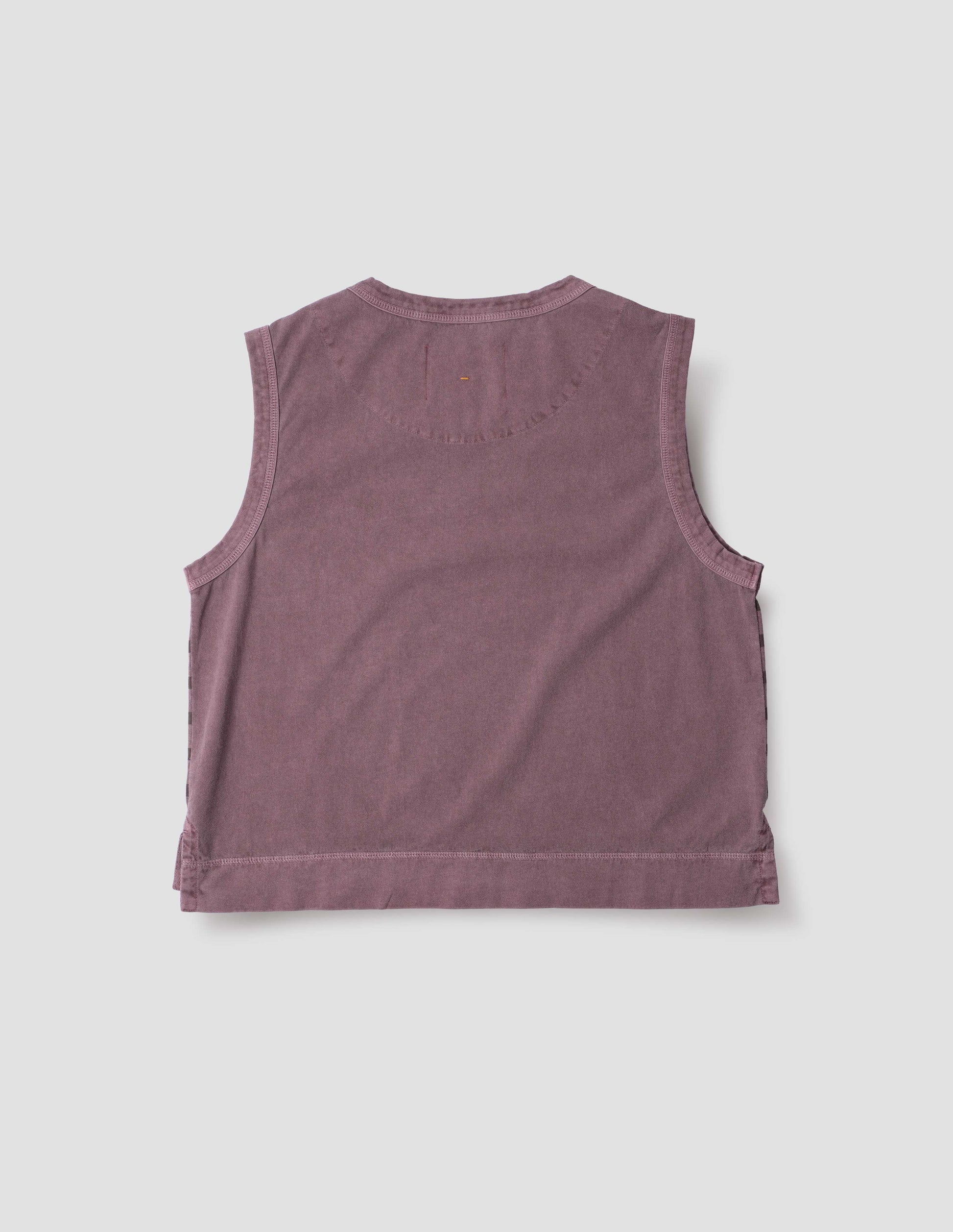 Purple cotton linen tank top with contrast ribbing on neckline and armholes, with stitch-through half moon on back yoke, side splits and deep stitch hem. Back flat lay view.