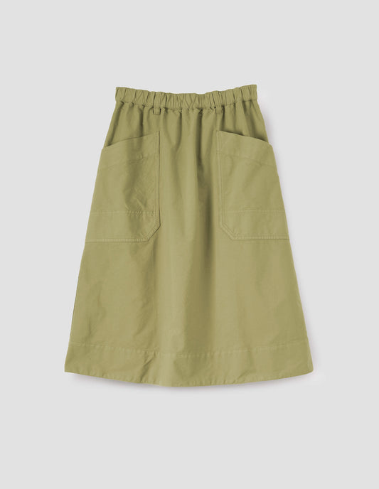 Light green skirt with two large patch pockets, elasticated waist and belt loops. Front flat lay view.