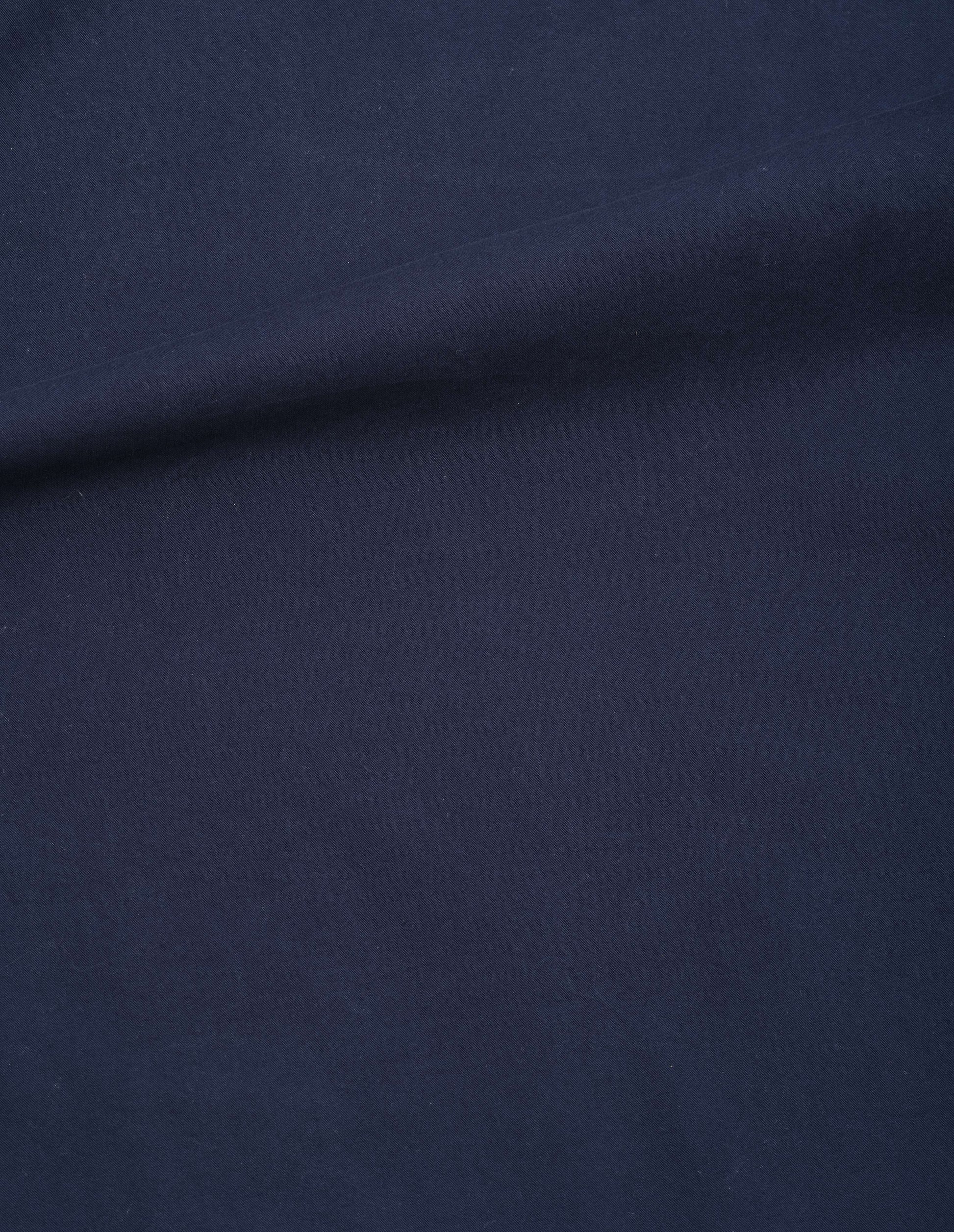 Dark blue dry cotton twill pleated shirt dress, fabric swatch. 