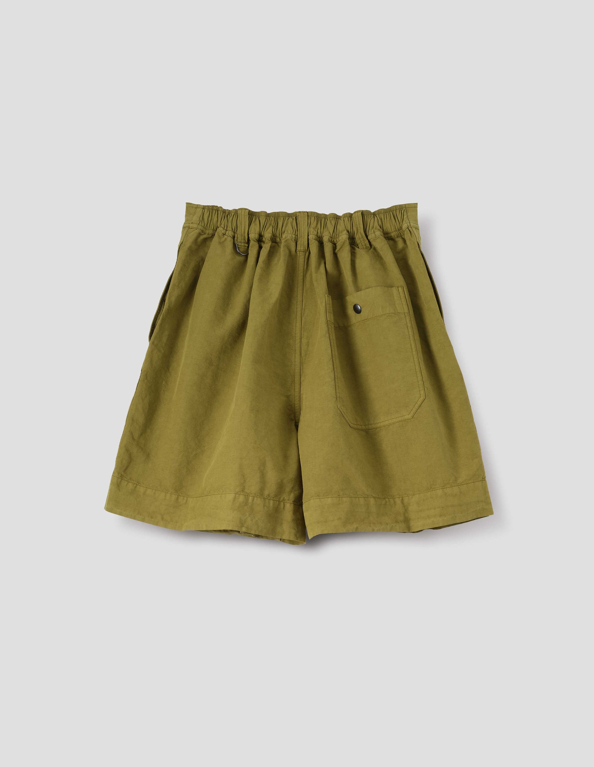 Yellowish green linen shorts with elasticated waist, belt loops with one D-ring detail and press stud fastening on back patch pocket. Back flat lay view. 