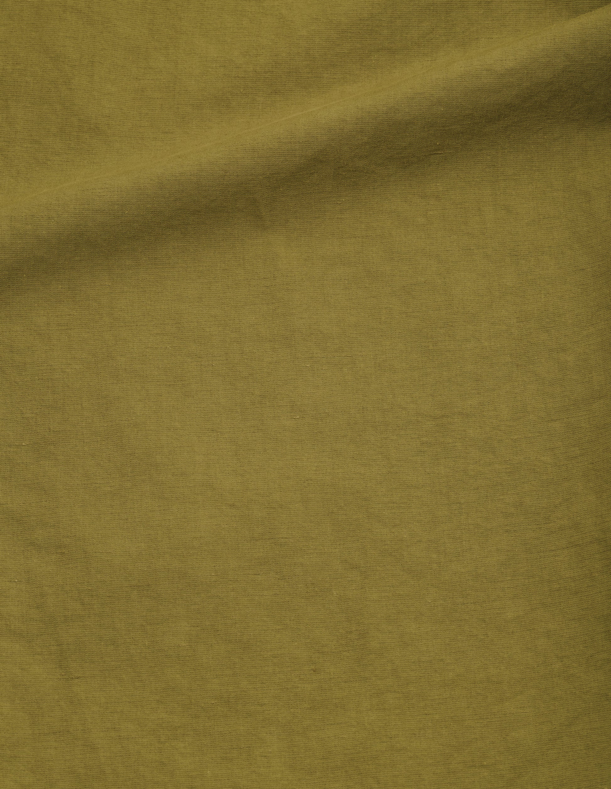 Yellowish green dry cotton linen shorts, fabric swatch.