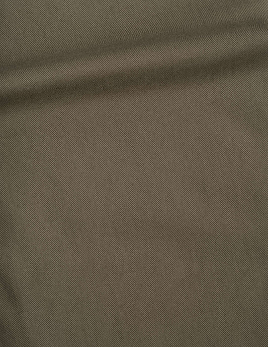 Green soft cotton drill skirt fabric swatch.