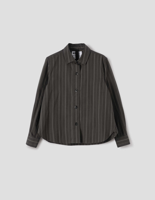Off black and khaki striped shirt, with corozo button fastening, hanger loop detail on inside collar and curved hem. Front flat lay view. 