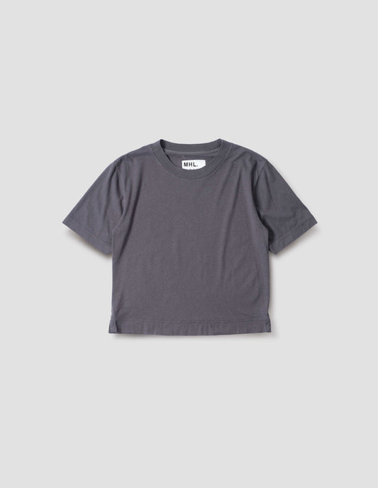 Greyish blue cotton and linen t-shirt, with herringbone tape detailing inside the neck and vent split hem. Front flat lay view.