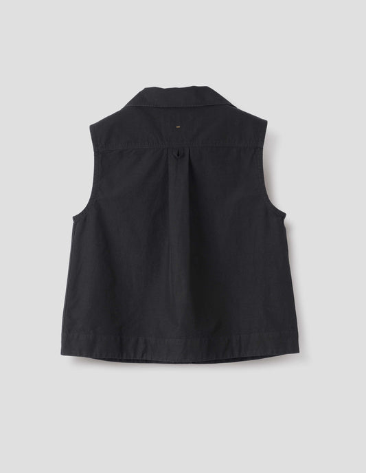 Black denim sleeveless shirt with box pleat and hanger loop detail on back yoke. Back flat lay view.