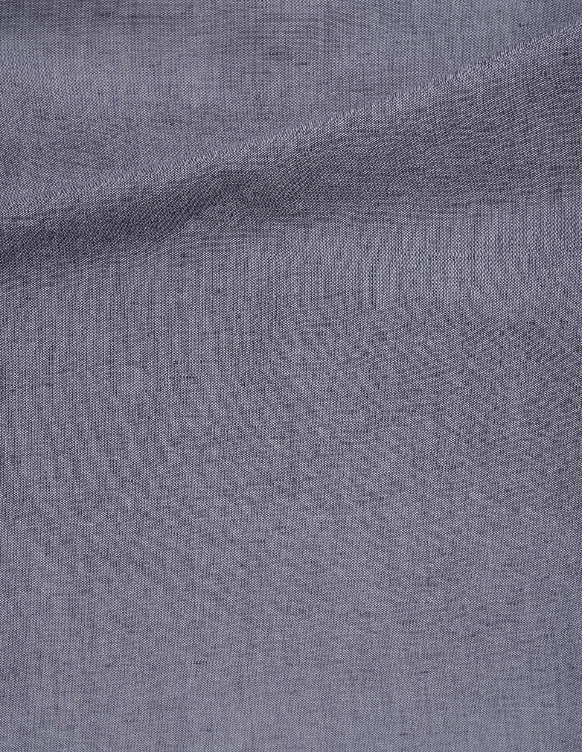 Blueish grey cotton sleeveless shirt with a one-piece open spread collar, wide stitch-through placket, corozo brace button closure and single chest pocket. Front flat lay view.