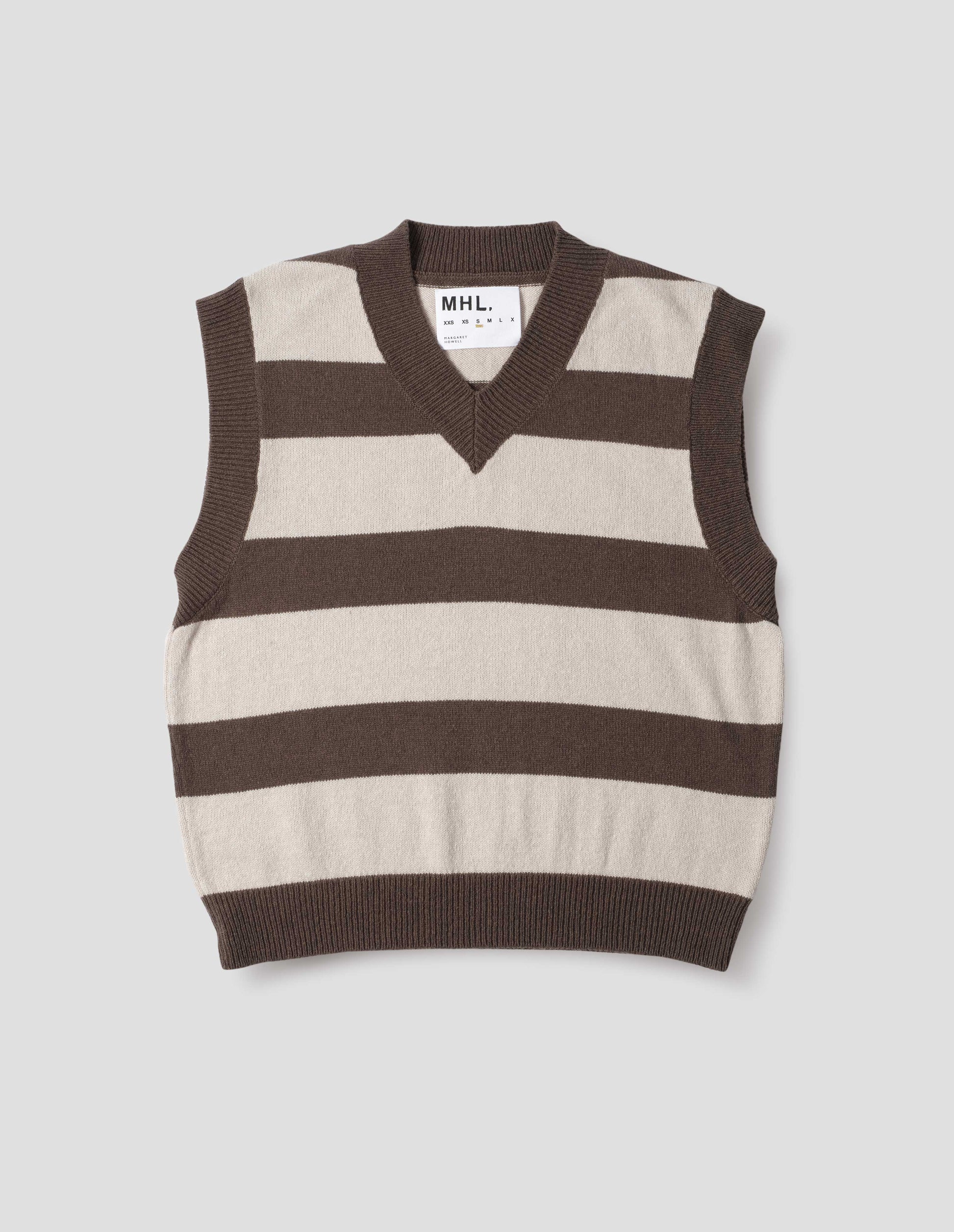 Brown and off white chunky striped sleeveless knitted jumper, with thick brown rib on v neck, armholes and hem, front flat lay view.