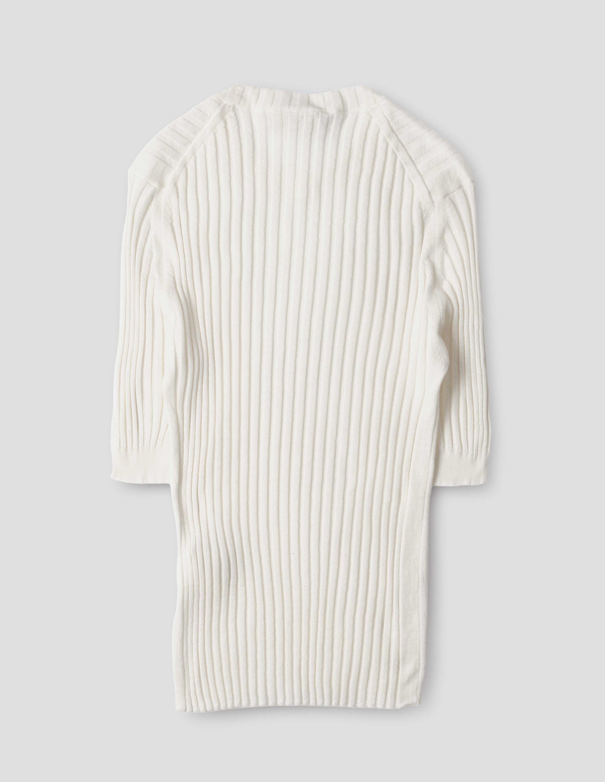 Beige knitted ribbed t-shirt with round neck and fine rib sleeve cuffs. Back flat lay view.