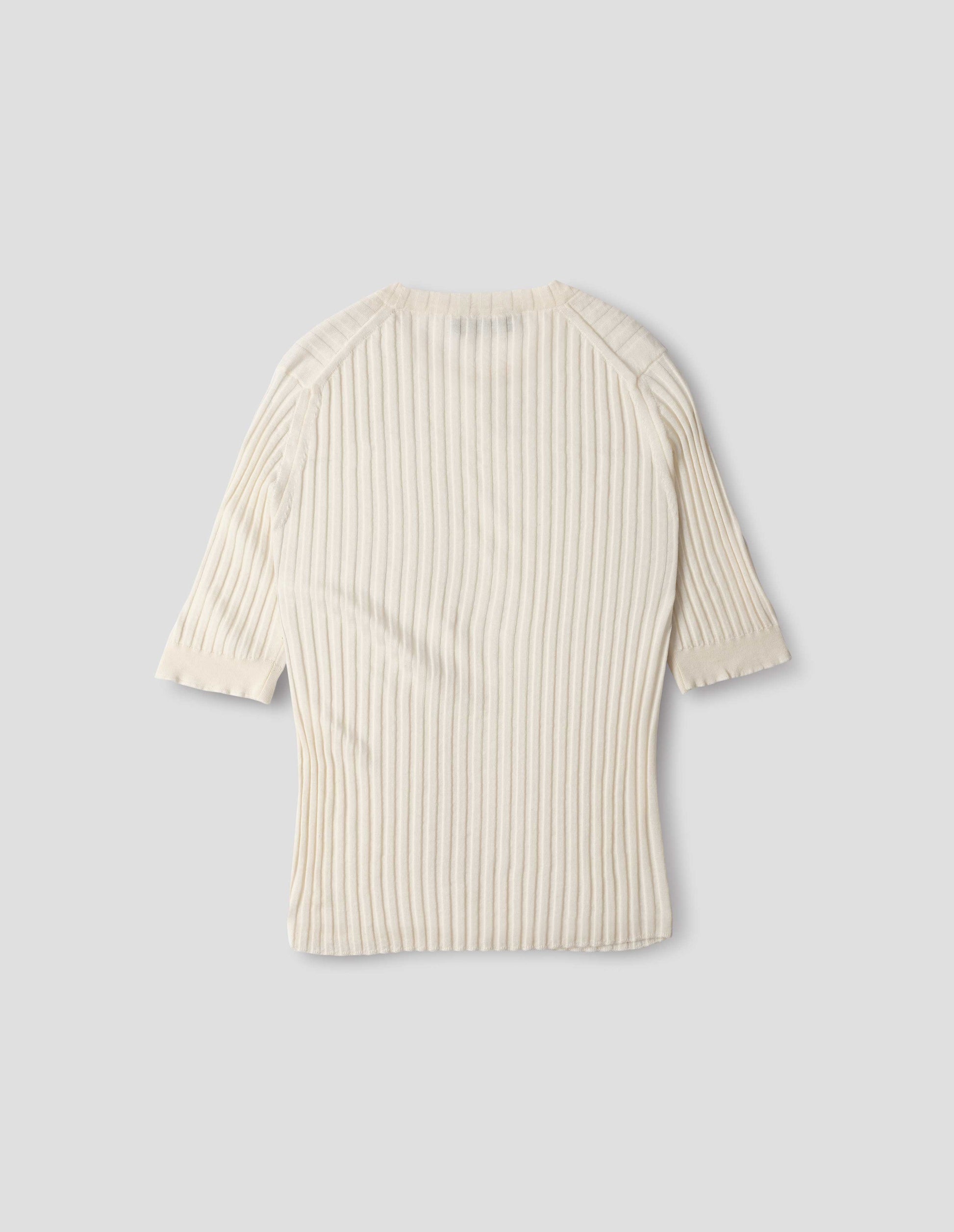 Beige knitted ribbed t-shirt with round neck and fine rib sleeve cuffs. Back flat lay view.