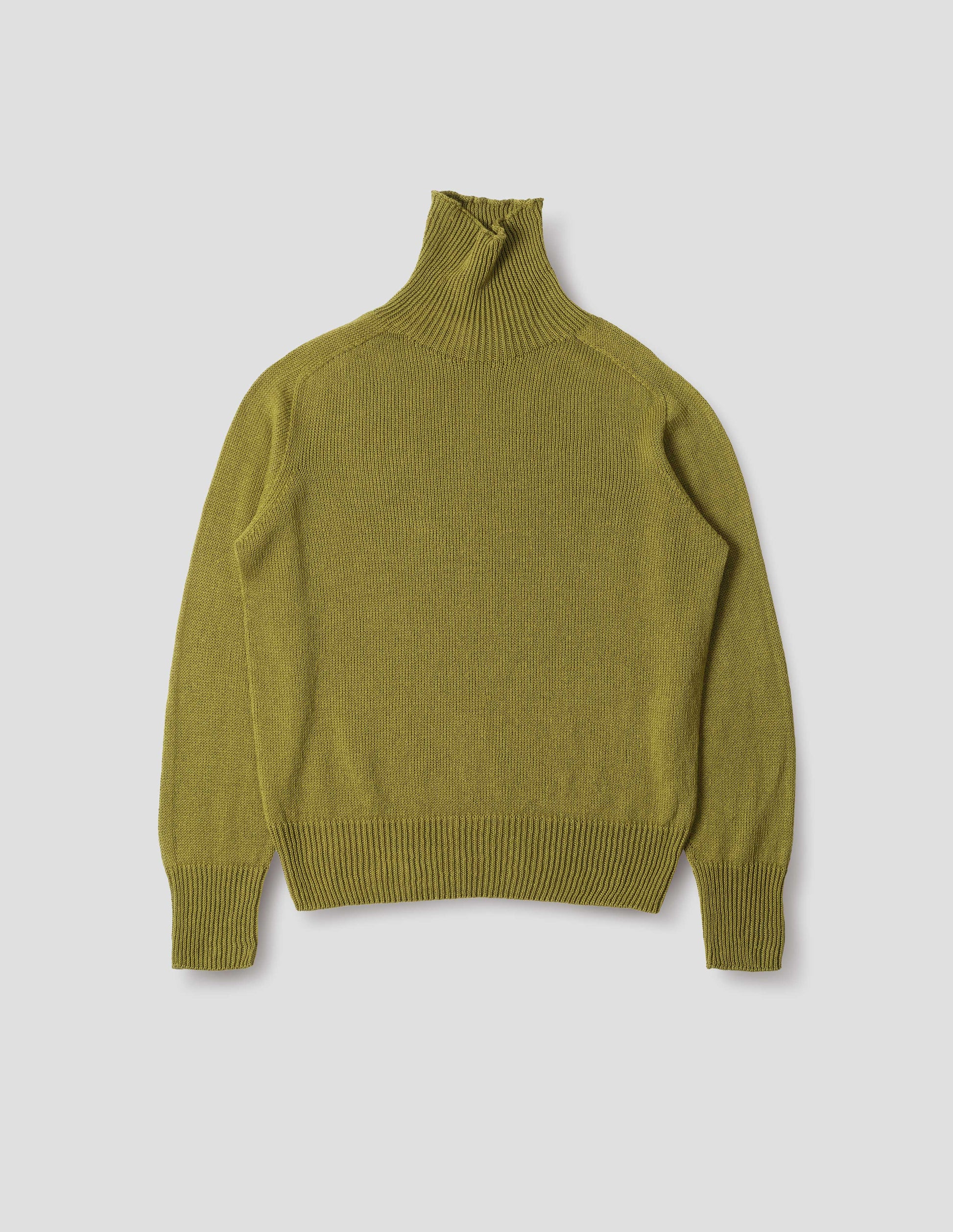 Yellowish green linen cotton roll neck jumper with long saddle sleeves and contrast rib on neck, cuffs and hem. Front flat lay view.