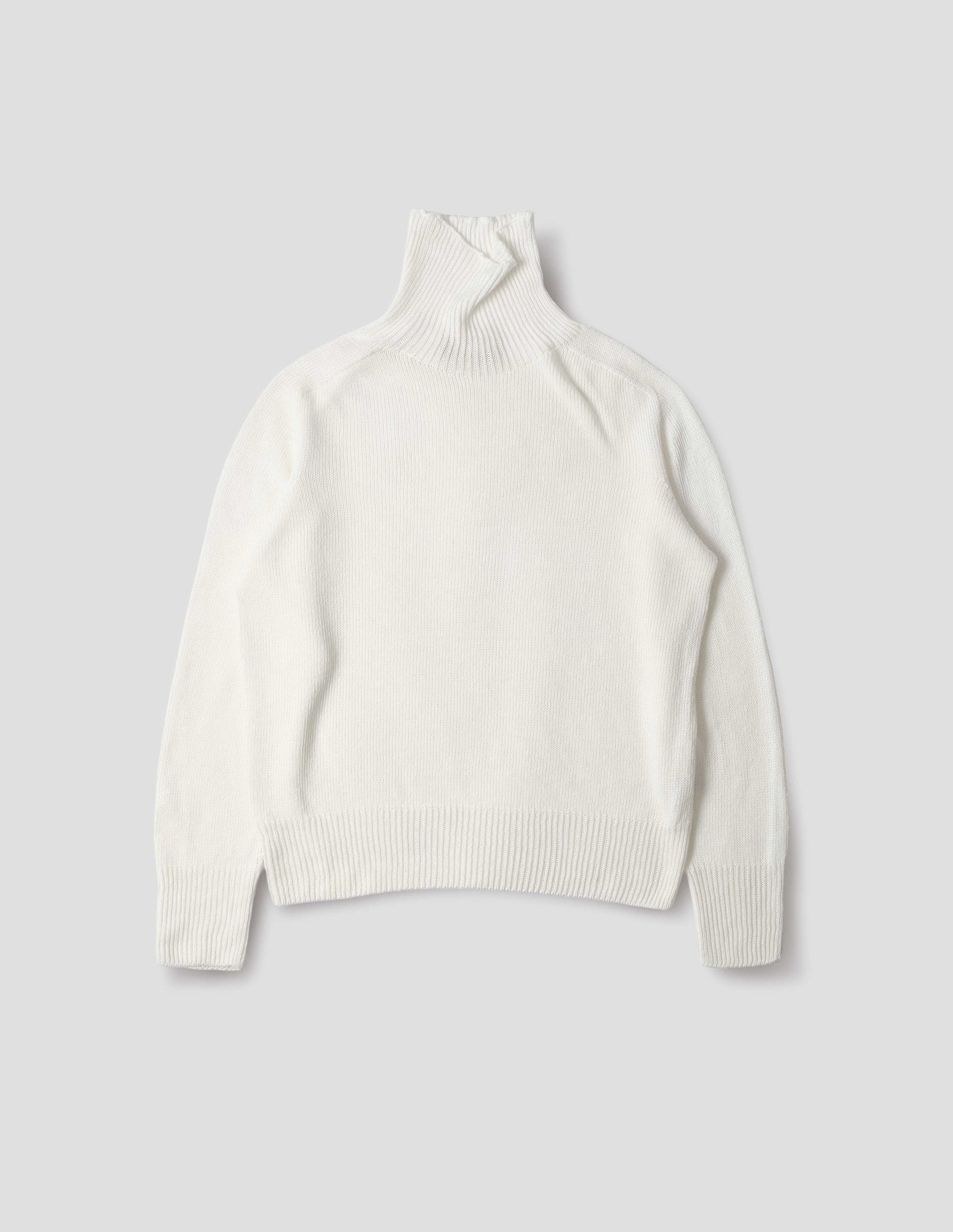 Off white linen cotton roll neck jumper with long saddle sleeves and contrast rib on neck, cuffs and hem. Front flat lay view.