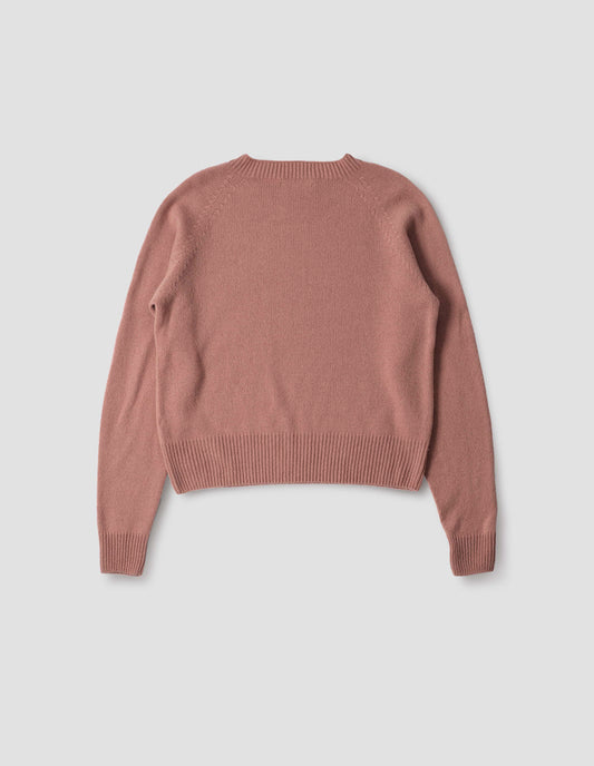 Pink long sleeve merino cashmere jumper, with raglan sleeve and contrasting rib on neck, cuffs and hem. Back flat lay view.