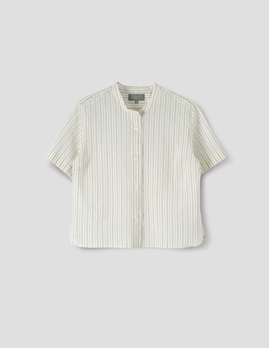 Striped beige and light blue collarless shirt with short sleeves, side split stepped hem and mother of pearl buttons on raised placket. Front flat lay view.