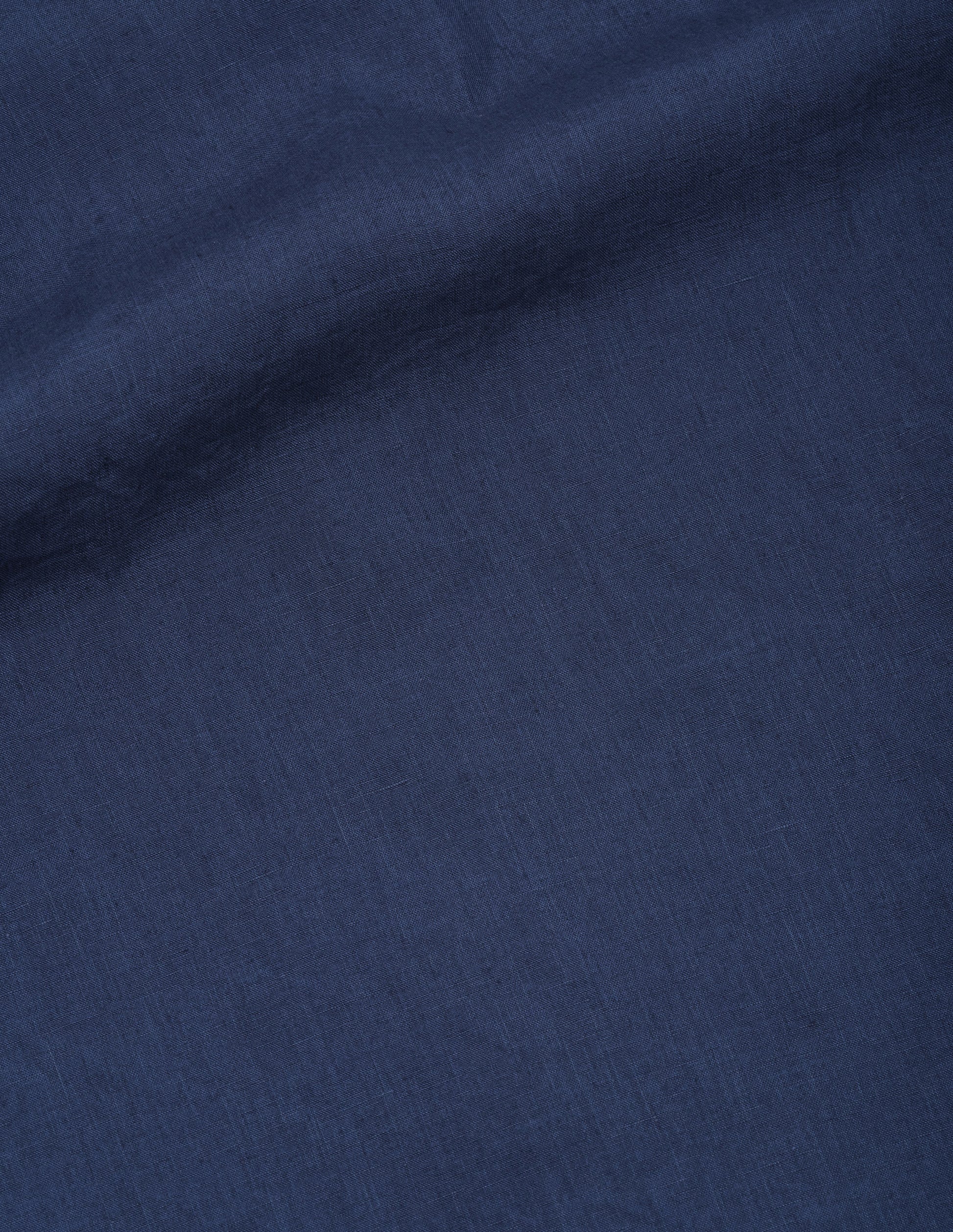 Dark blue shirting linen sleeveless top, fabric swatch.