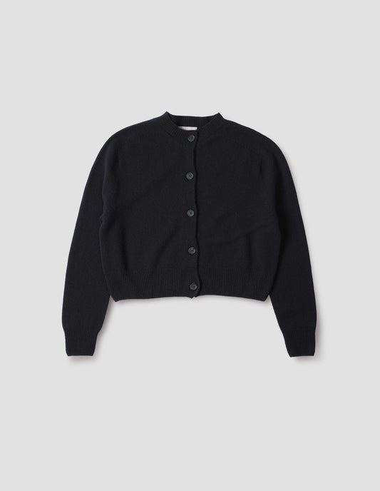 Dark navy  long sleeve merino cashmere cardigan with contrast rib neckline, cuffs and hem and dark horn buttons. Front flat lay view.