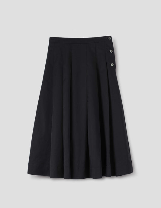 Black  relaxed cut below knee skirt, minimal waistband and side button fastening, stitched down pleats, and concealed side seam pockets. Front flat lay view.