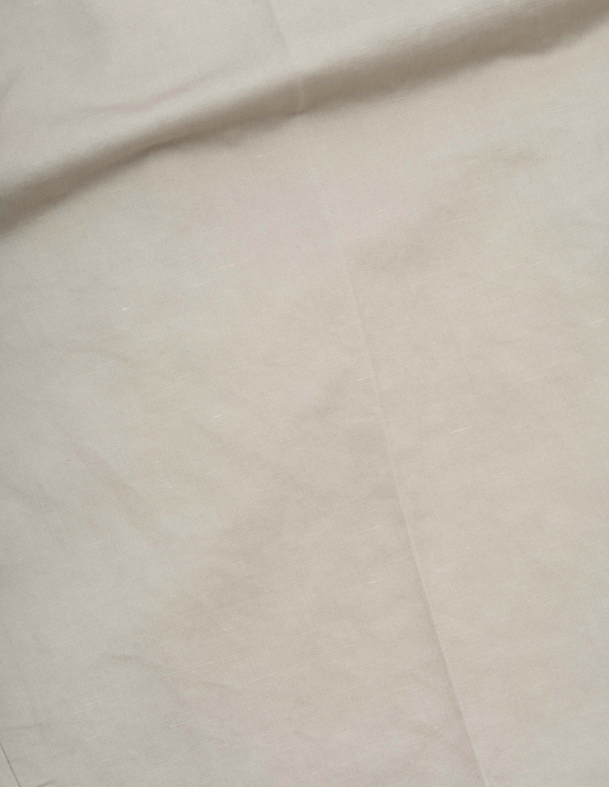 Beige compact cotton linen blend trousers fabric swatch.