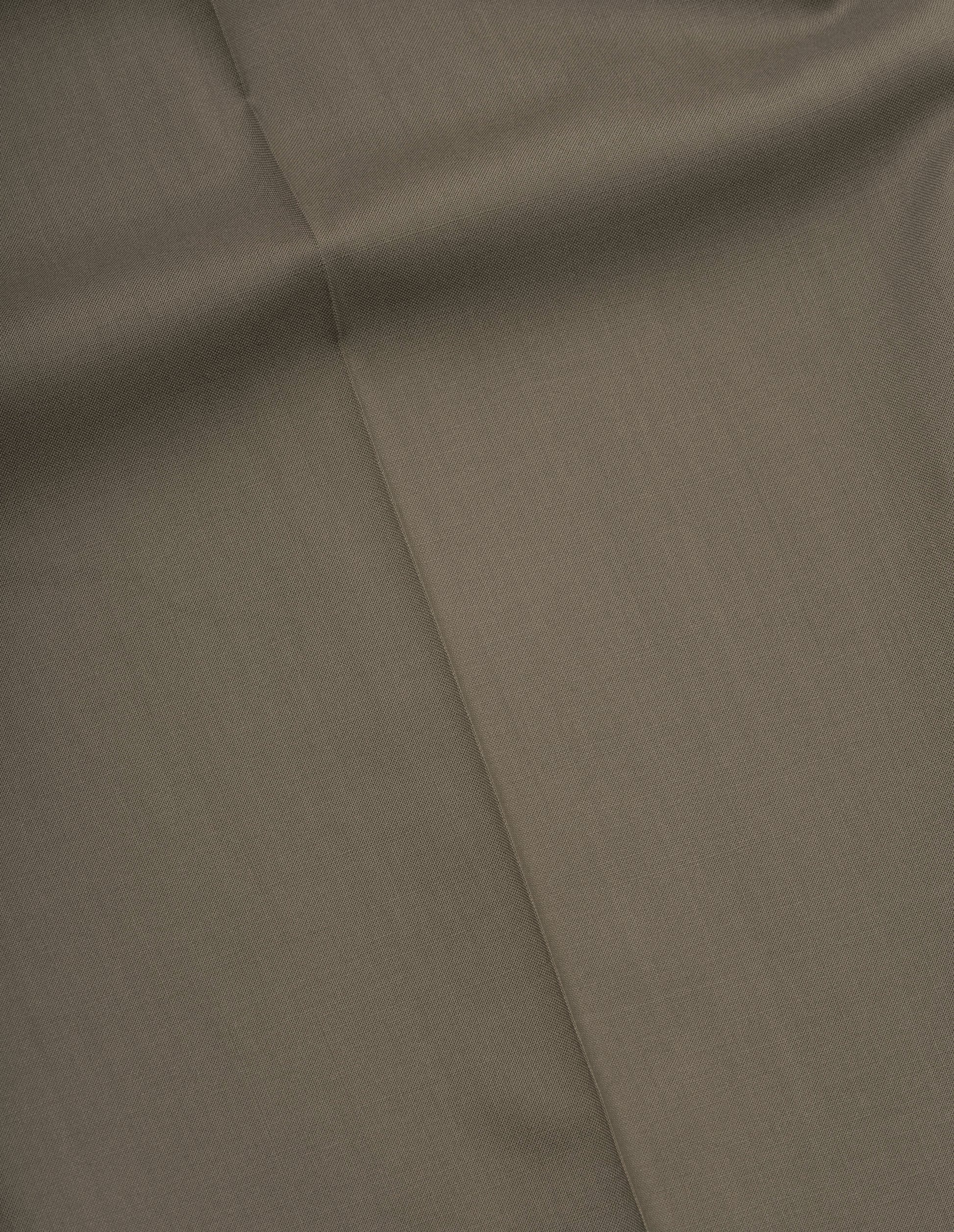 Brown high twist wool trousers fabric swatch.