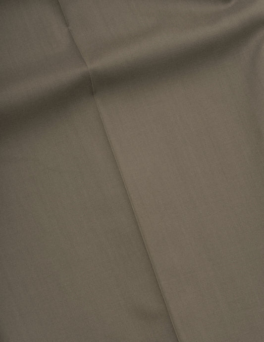 Brown high twist wool trousers fabric swatch.
