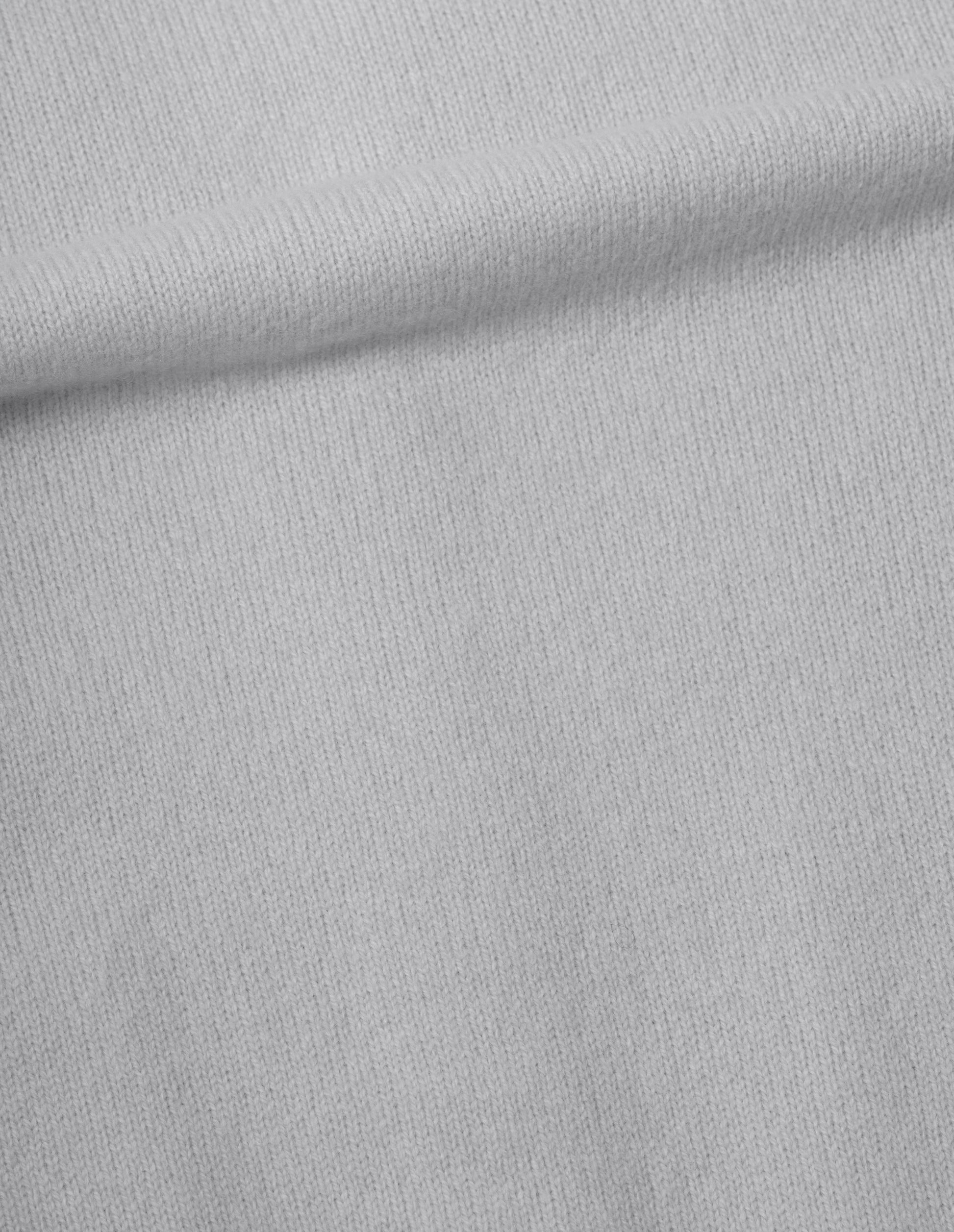 Light grey merino cashmere bed shawl, fabric swatch.