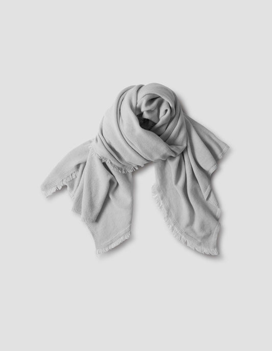 Light grey merino wool and cashmere bed shawl, front view of garment wrapped like scarf.