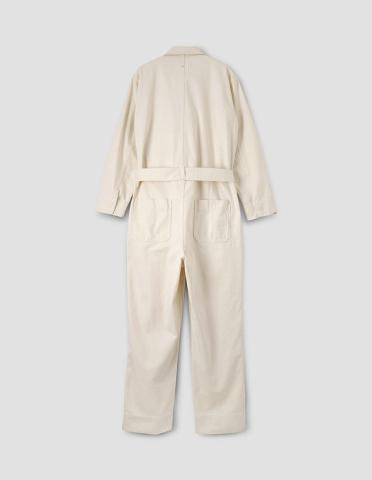 White overalls with   belt and belt loops, patch back pockets and corozo brace buttons on cuffs. Back flat lay view.
