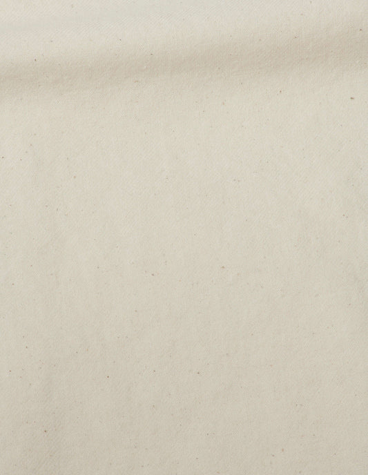 White workwear cotton drill overalls fabric swatch.