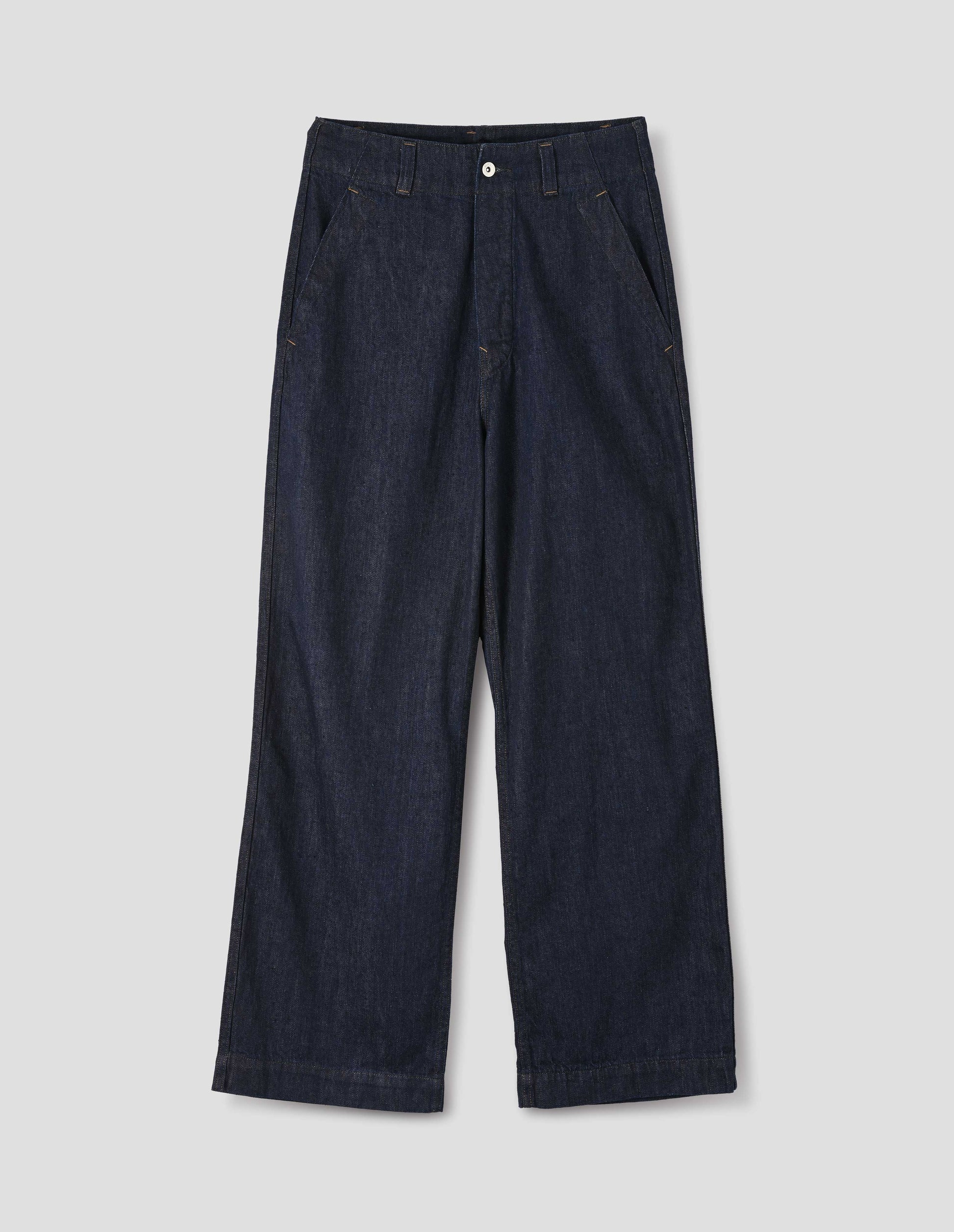 Indigo blue wide leg light denim twill jean, with metal button closure, button through waistband and slant side pockets. Front flat lay view.