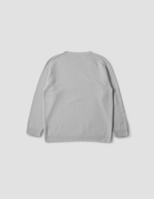Light grey merino cashmere bed jumper with raglan sleeve and contrast rib on neck, cuffs and hem, Back flat lay view.