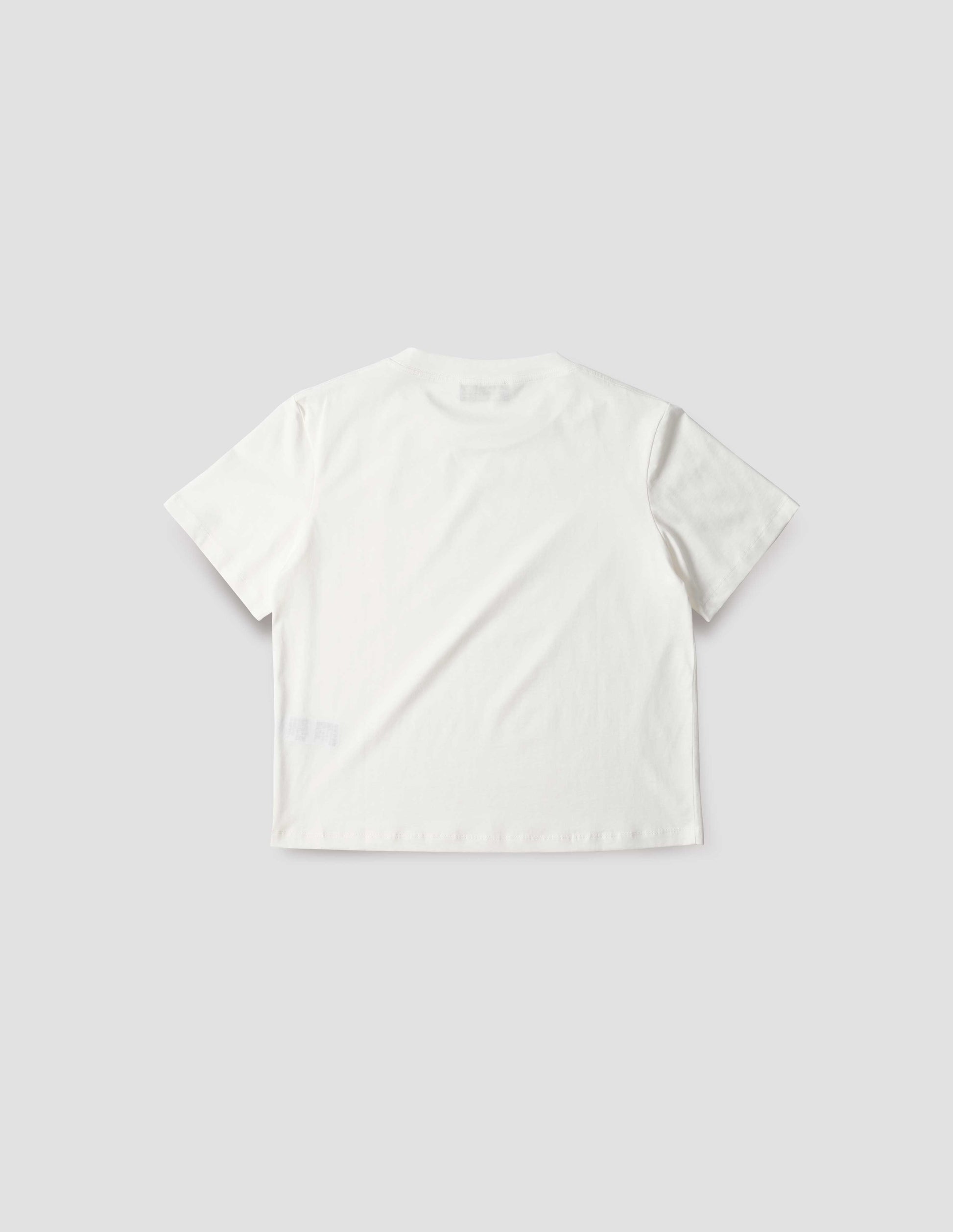 Off white cotton short sleeve t-shirt with boxy cut, back flat lay view.