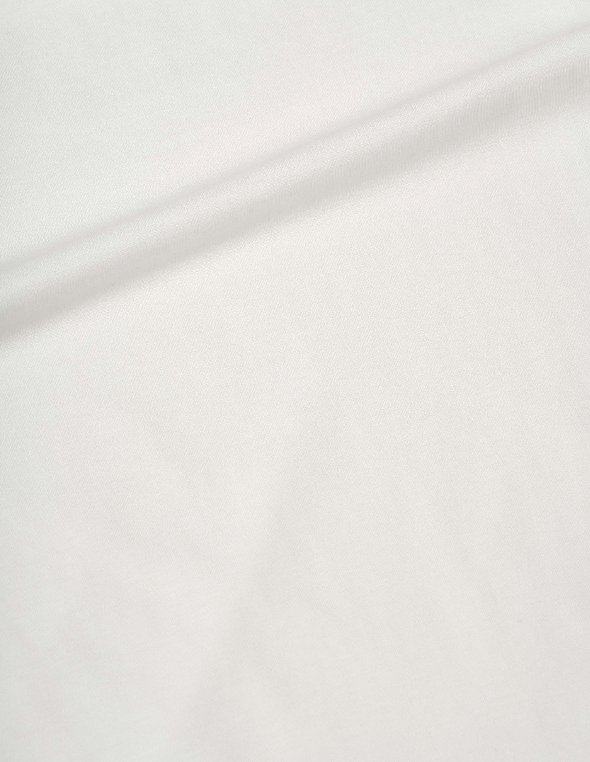 Off white fine cotton jersey short sleeve t-shirt, fabric swatch.